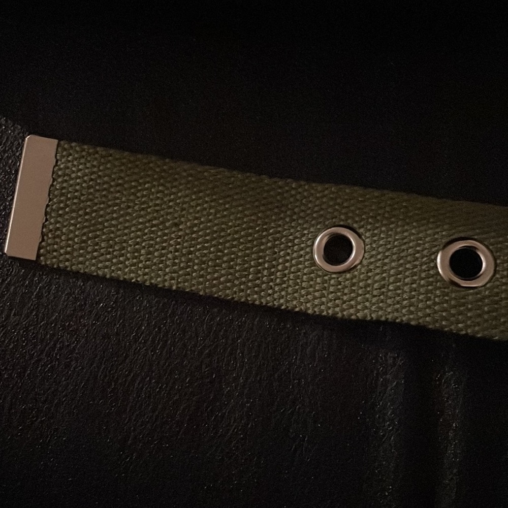 Women’s— green belt, with silver metal punch holes and silver buckle. - Picture 2 of 2